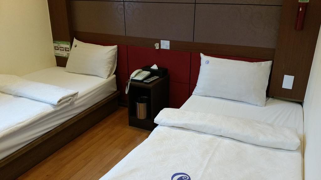 Coups Hotel Сеул Стая снимка